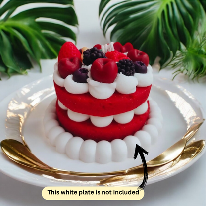 Red two layer berry cake scented candle topped with raspberries and blackberries