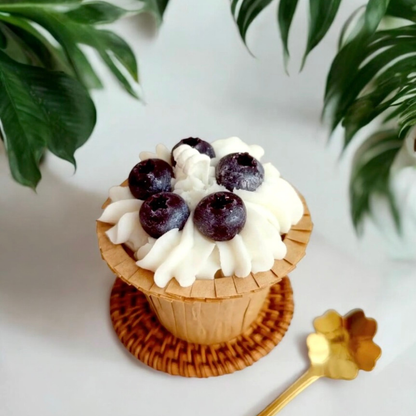Vanilla swirl cupcake scented candle topped with blueberries