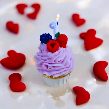 Lavender taro cupcake scented candle with raspberry and blackberry, lit