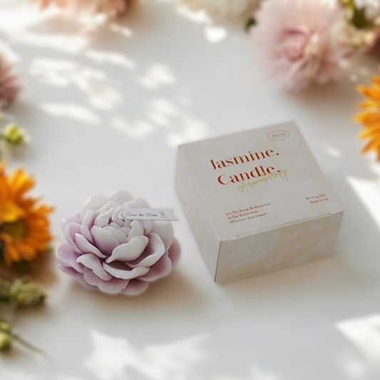 Lilac purple peony flower scented candle beside its Jasmine Candle gift box