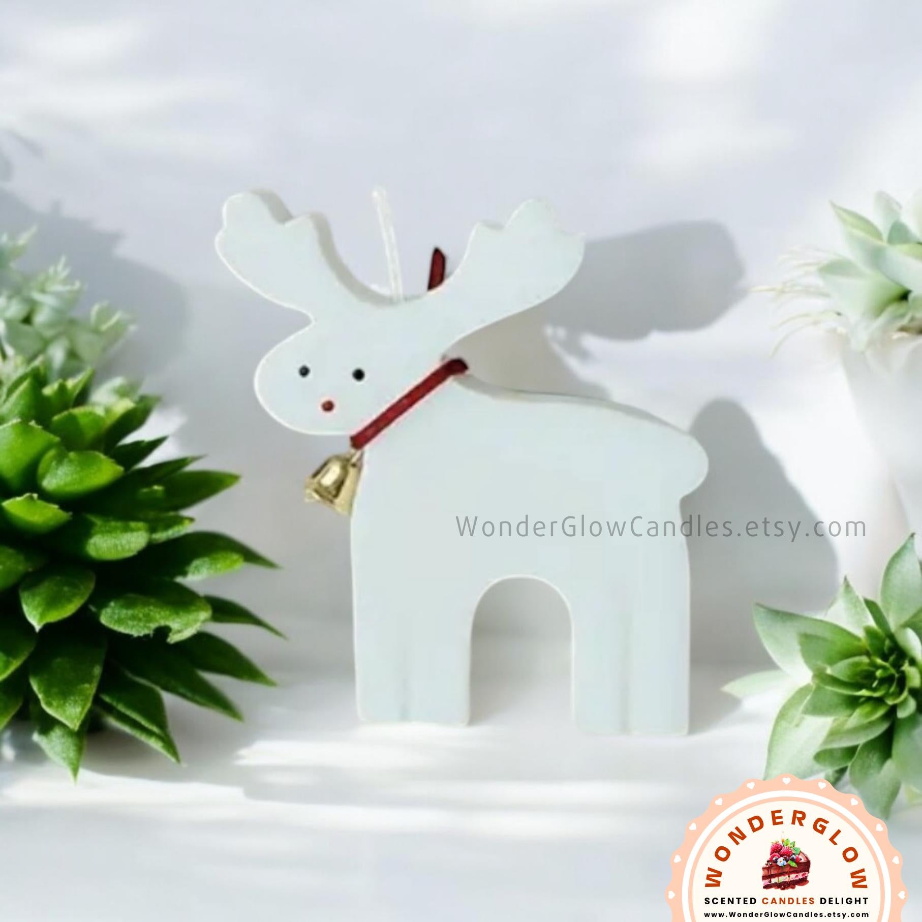 Reindeer scented candle shown lit