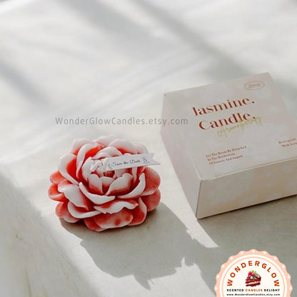 Flower scented candle shown lit