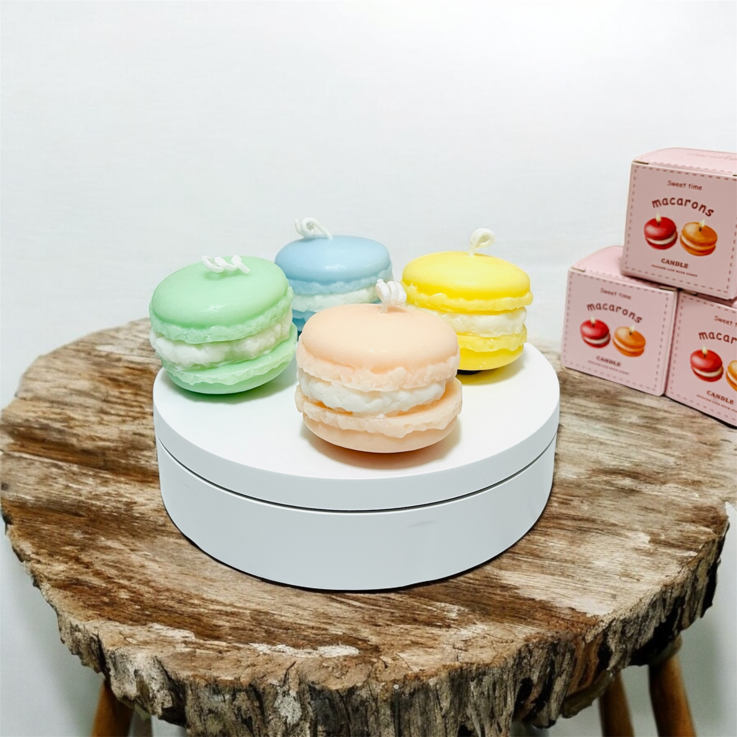 Pastel macaron scented candles in peach, green, blue and yellow with gift boxes