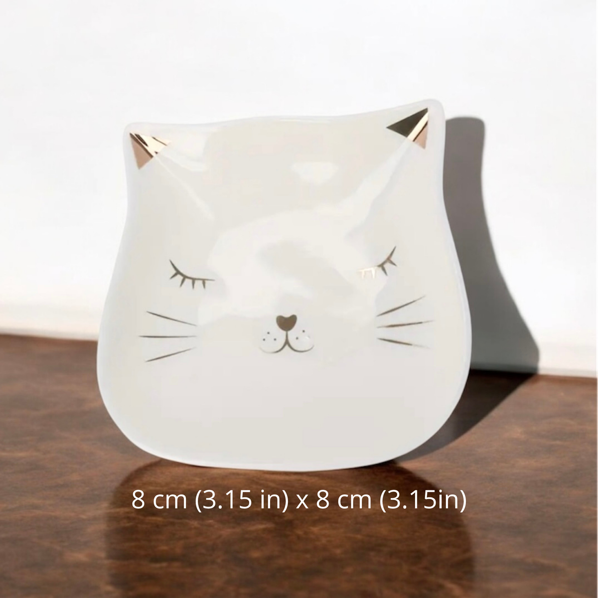 Cat shaped ceramic trinket plate with gold ears, 8 cm by 8 cm