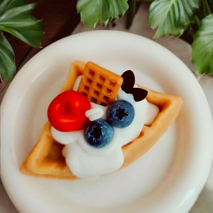 Triangle waffle scented candle with cream, cherry, blueberries and a mini waffle