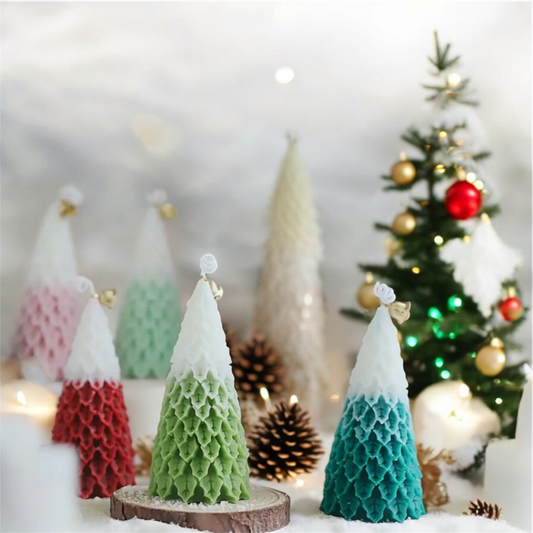 Assorted ombre Christmas tree scented candles in pink, red, light green, mint and teal with gold bells